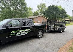 Cory's Cleanouts truck and trailer ready for a Byron junk removal job